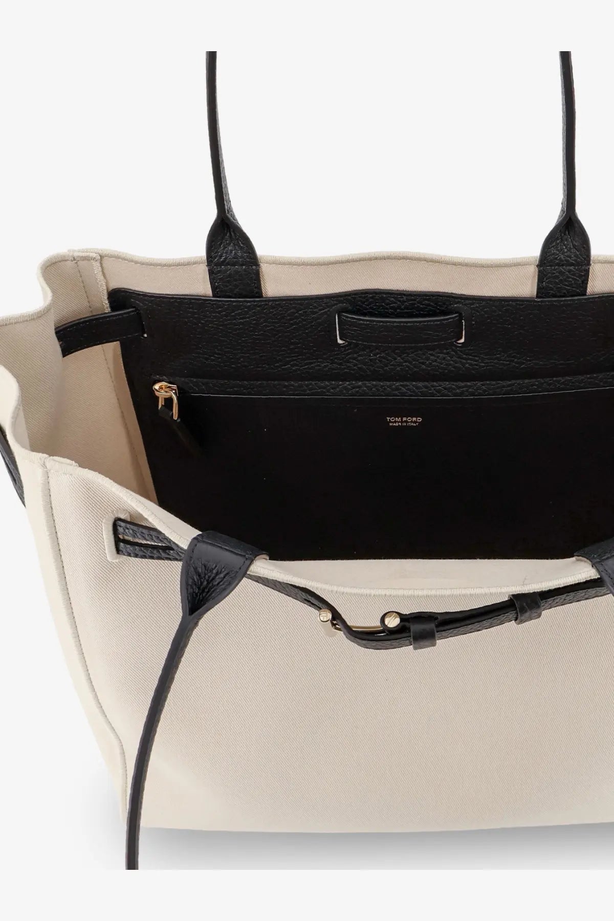Beige canvas tote bag with black leather handles and trim featuring gold-tone zipper pull tom ford womens shoulder bag black