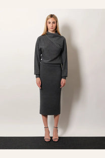 Tom ford women’s cashmere and cotton grey turtleneck sweater with high neckline and asymmetrical seam paired with pencil skirt