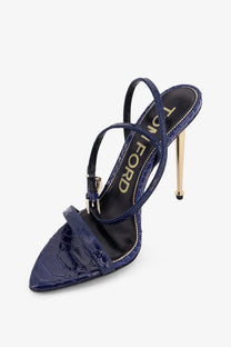 Tom Ford women’s navy blue crocodile-embossed leather sandal with gold-tone heel and ankle strap viewed from the back
