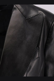 Tom Ford women’s black leather blazer with precise stitching and a sleek tailored design