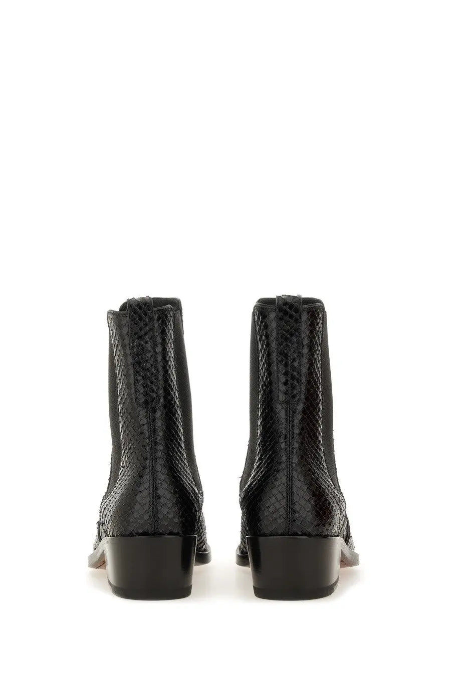 Tom Ford women’s black leather ankle boots with snake-print texture and low block heels in a sleek glossy finish