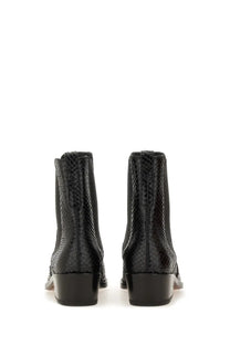 Tom Ford women’s black leather ankle boots with snake-print texture and low block heels in a sleek glossy finish