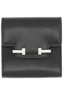 Tom Ford women’s black leather card holder with textured finish and silver tone h shaped clasp