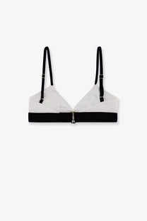 Tom Ford women’s white modal bra with black and white triangle cups, adjustable straps, and central zipper detail