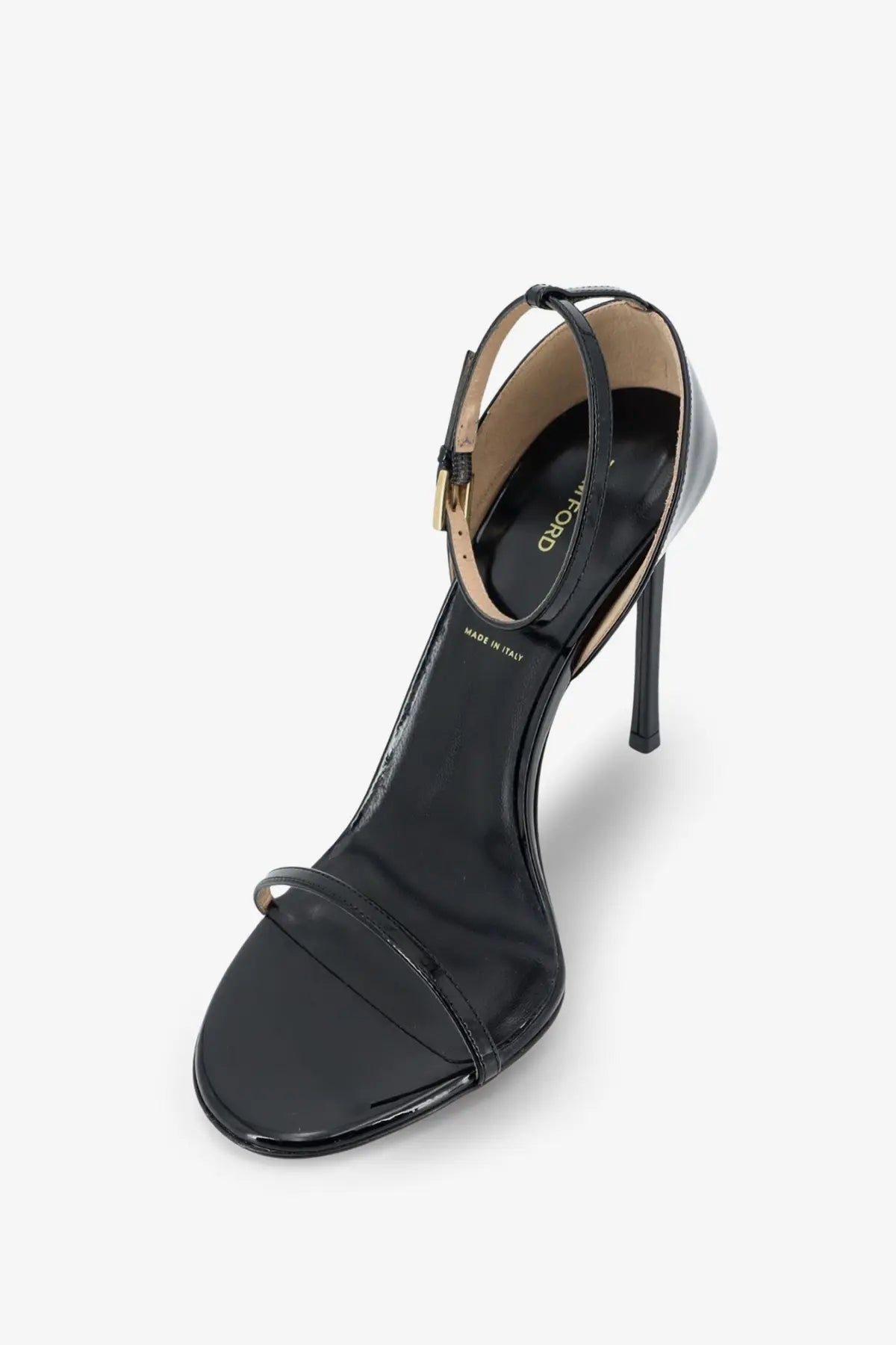Tom Ford women’s black patent leather high-heeled sandal with slender ankle strap and gold-tone buckle