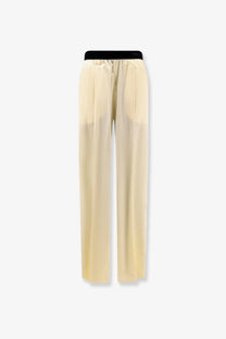 Tom Ford women’s cream silk stretch satin trousers with black elastic waistband for lightweight comfort