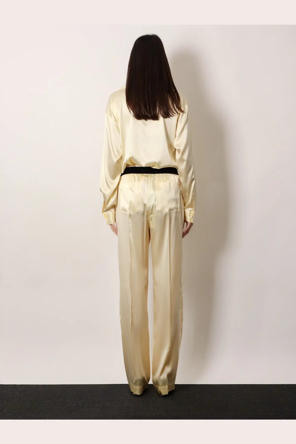 Cream-colored stretch satin pajama set with black belt from tom ford women’s pyjamas yellow collection
