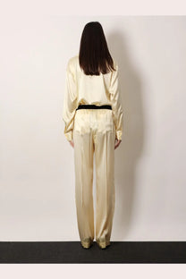 Cream-colored stretch satin pajama set with black belt from tom ford women’s pyjamas yellow collection