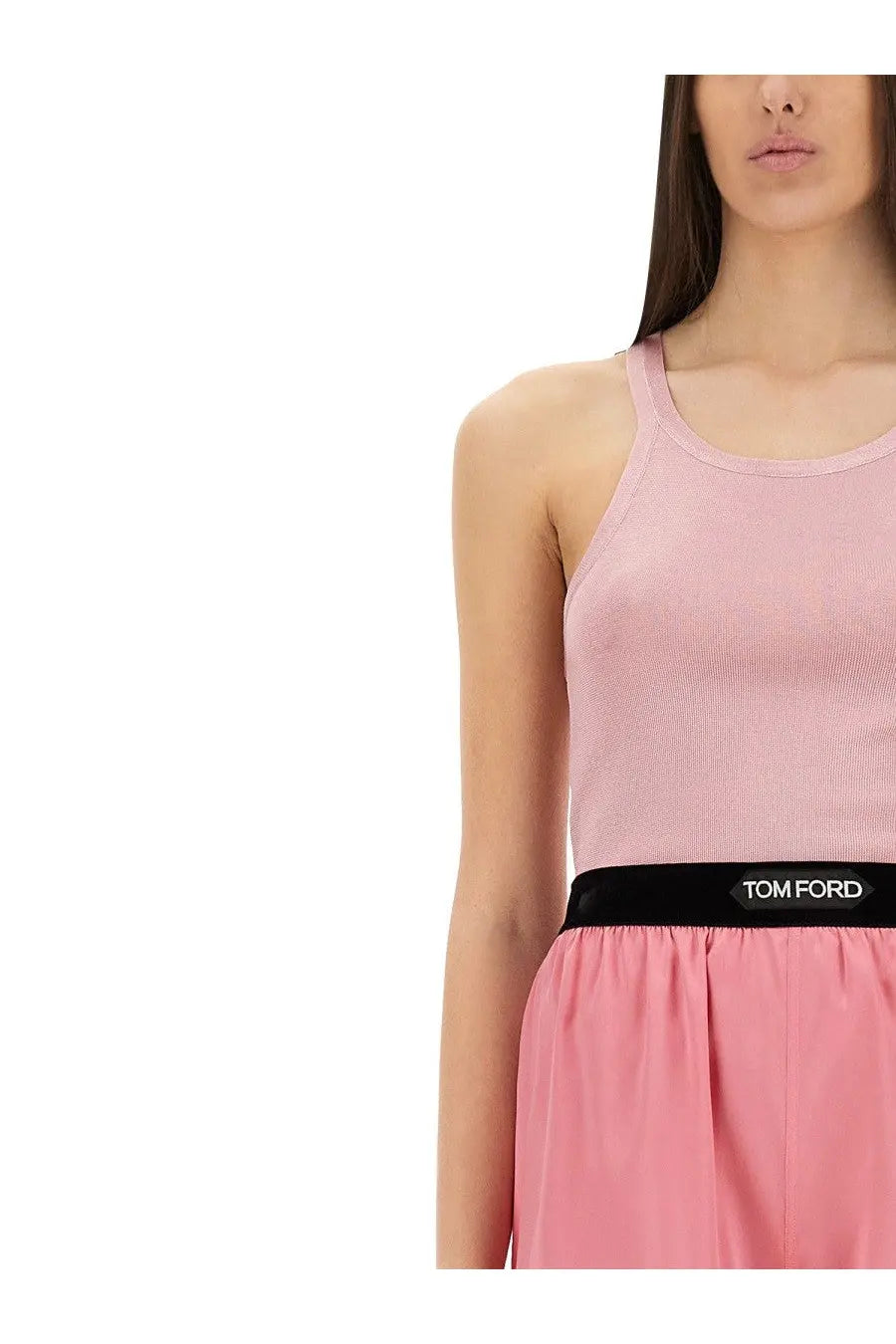 Pink ribbed knit tank top with black elastic tom ford waistband contrast with tom ford blue silk knit tank top