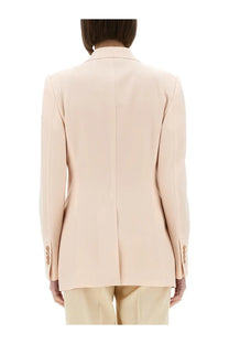 Tom Ford women’s single breasted wool jacket in pale pink with tailored fit and subtle seam detailing