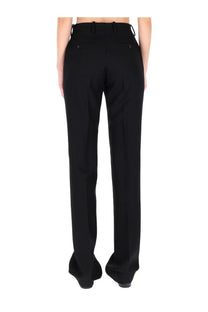 Black tailored trousers by tom ford womens with straight-leg cut and subtle pleats at the back view