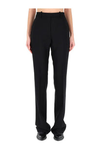 Tom Ford women’s tailored pants black straight-leg cut with subtle creasing crafted from smooth structured fabric