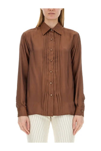 A sleek long-sleeved brown silk Tom Ford women’s twill shirt with a classic collar and front vertical pleats