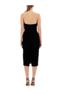 Tom Ford women’s black velvet strapless midi dress with fitted silhouette and back zipper detail shown from the back