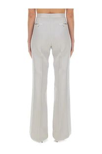 Tom Ford women’s light gray high-waisted trousers with straight-leg cut and metallic silver flap pockets