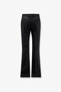 Tom Ford women’s black satin flare pants with sleek smooth texture and subtle sheen made from wool and silk