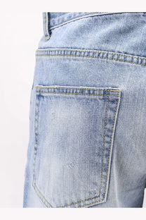 Back side of tonywack men’s straight fit cotton jeans in light-wash denim with classic pocket stitching and subtle fading