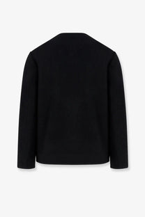 Tonywack men’s tweed blazer black with a simple minimalist design featuring a black long-sleeved sweater material