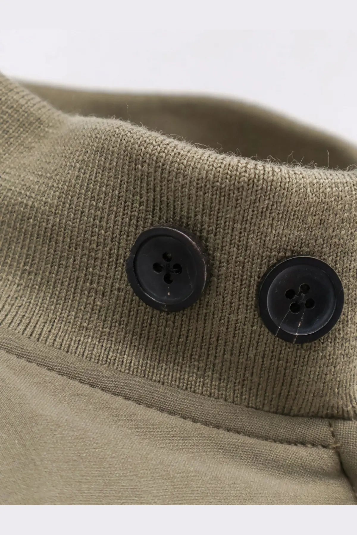 Tonywack men’s wool blend jacket green featuring an olive green knit turtleneck with two black four-hole buttons