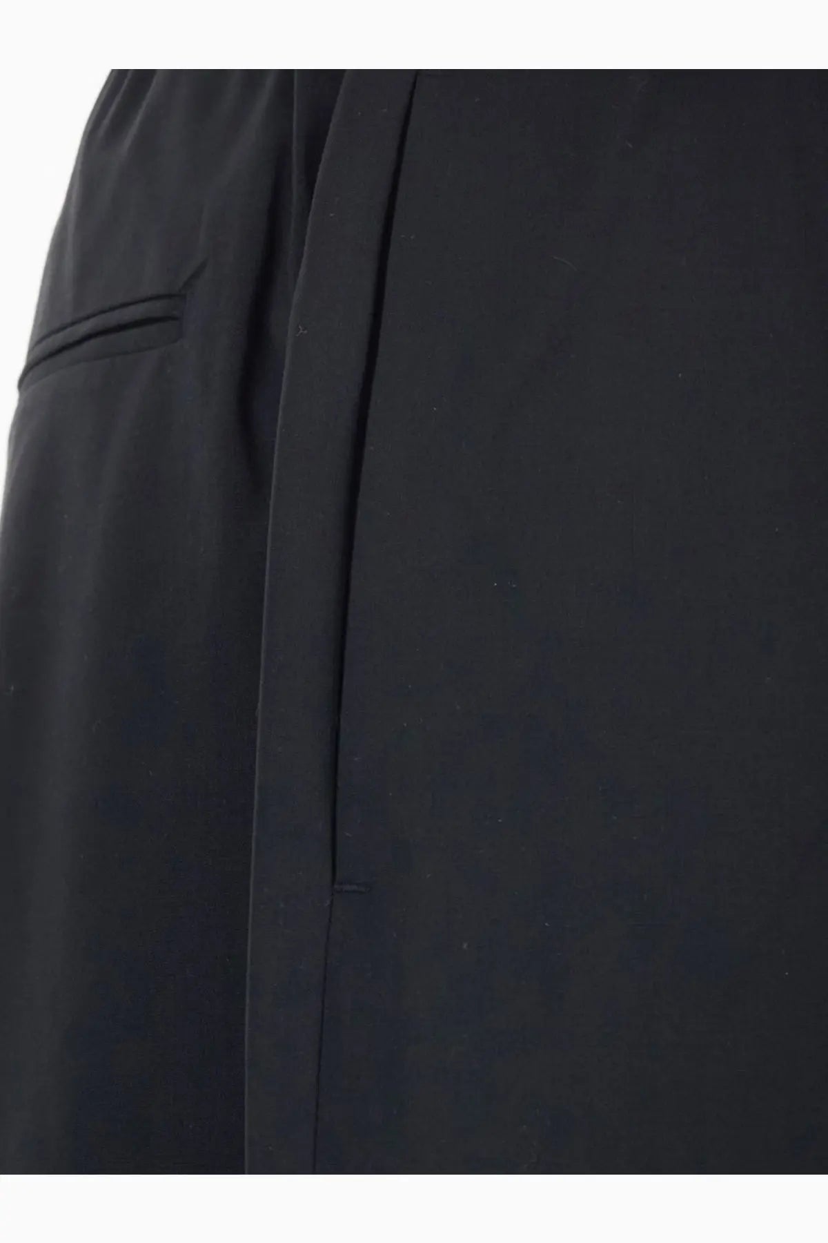 Tonywack men’s black wool blend tailored trousers with sleek minimalist design and subtle side seam pleating