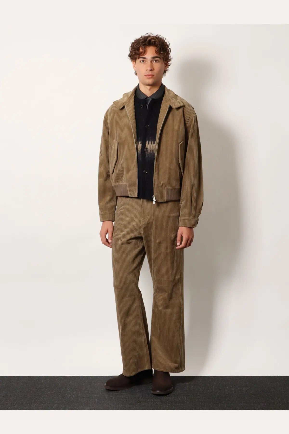 Brown corduroy jacket with vertical stripes and matching beige Tonywack unisex corduroy trousers