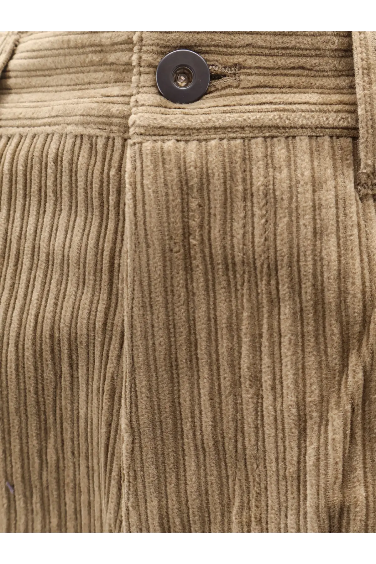Tan corduroy unisex trousers by Tonywack featuring a dark button at the waistband in beige color