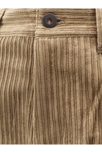Tan corduroy unisex trousers by Tonywack featuring a dark button at the waistband in beige color