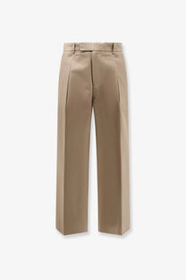 Beige pleated wide-leg cotton trousers with structured waistband and straight-cut legs by tonywack unisex