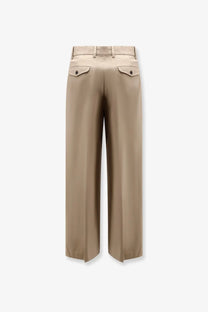 Beige cotton wide-leg trousers with sleek tailored fit and two flap pockets at the back by tonywack unisex