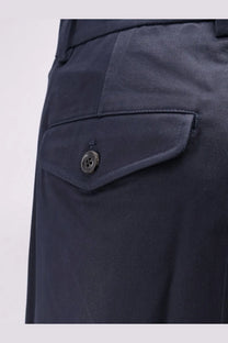 Dark navy cotton chino pants with subtle ribbed texture and single button front pocket from tonywack unisex trousers