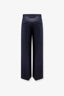 Navy blue cotton tonywack unisex trousers with a tailored fit and subtle front pockets in wide-leg style
