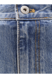 Blue denim fabric with tan stitching and silver button detail on tonywack unisex flared leg jeans