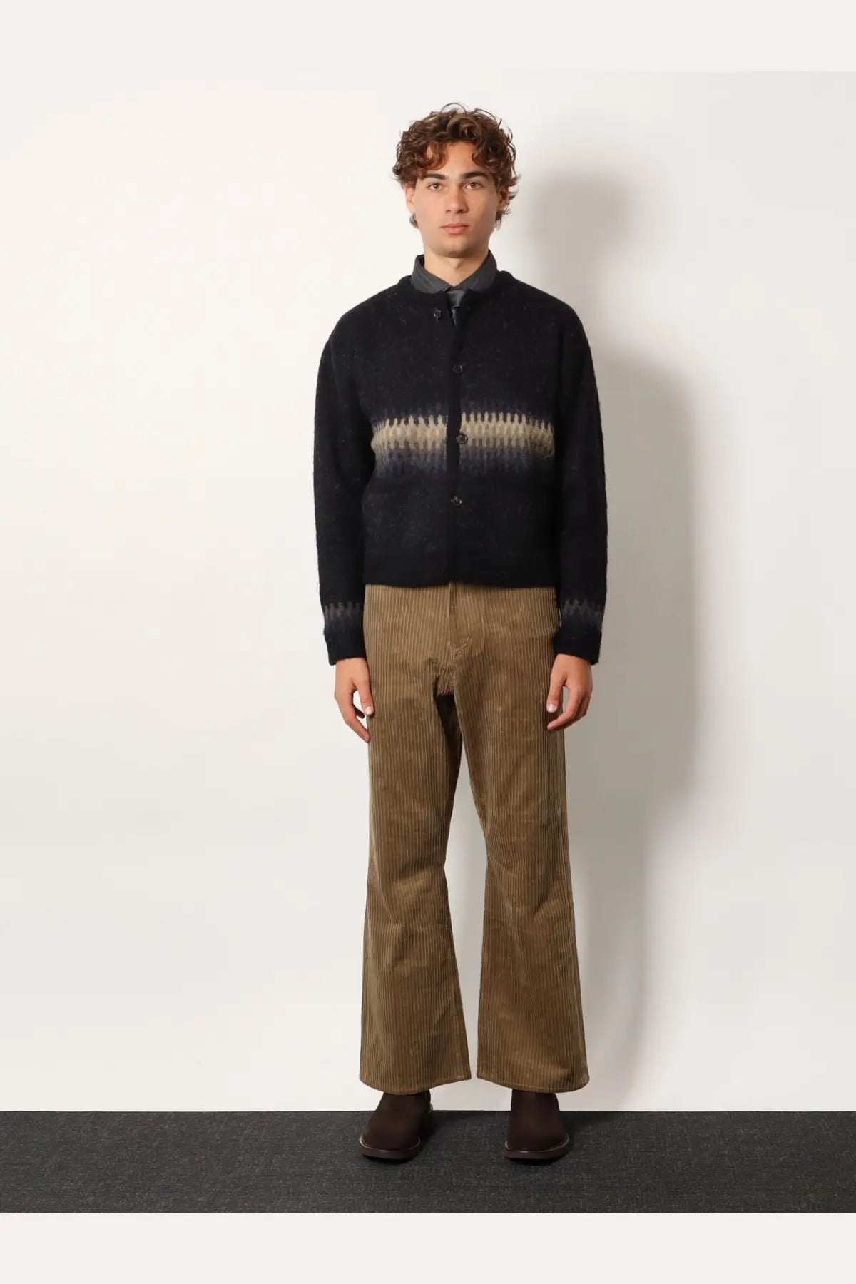 Black knit jacquard alpaca cardigan by tonywack with beige gray gradient and button closures across the chest