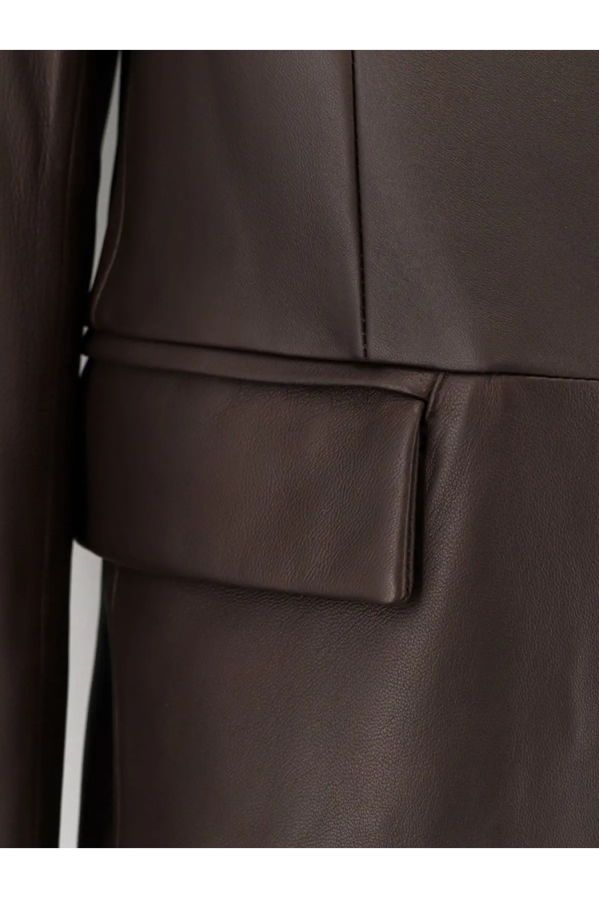 Tonywack unisex leather coat brown featuring a dark brown leather jacket pocket with clean stitching and subtle texture
