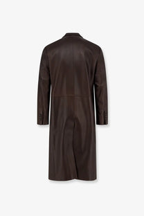 A sleek dark brown tonywack unisex leather coat with classic tailored fit and subtle stitching details