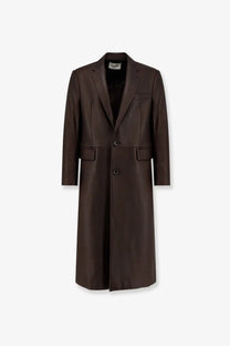 A sleek dark brown leather overcoat with classic double-breasted design and front pockets by tonywack unisex