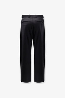 Black tailored Tonywack unisex wool blend trousers with sleek straight-leg cut and subtle side seam detailing