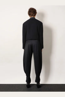 Black tailored wool blend suit featuring a structured blazer and wide-leg trousers for unisex wear by Tonywack
