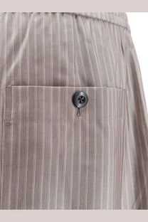 Tonywack women’s grey polyester and wool blend trousers with subtle texture and dark gray button detail on front pocket