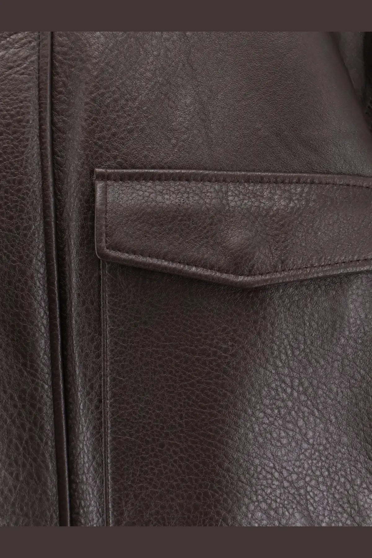 Tonywack women’s unisex dark brown leather jacket with textured surface and stitched pocket detail