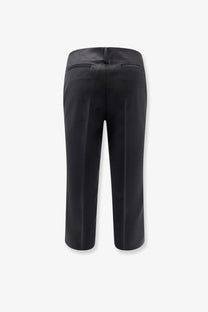 Tonywack women’s black wool blend capri trousers with sleek straight-leg cut and subtle back pleats shown from the back