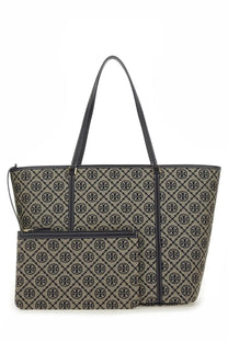 Beige and black patterned Tory Burch tote bag with signature logo design from the borsa shopping monogram con zip blue collection