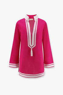A vibrant fuchsia long-sleeved cotton tunic top with white trim and tassel details from tory burch women’s collection