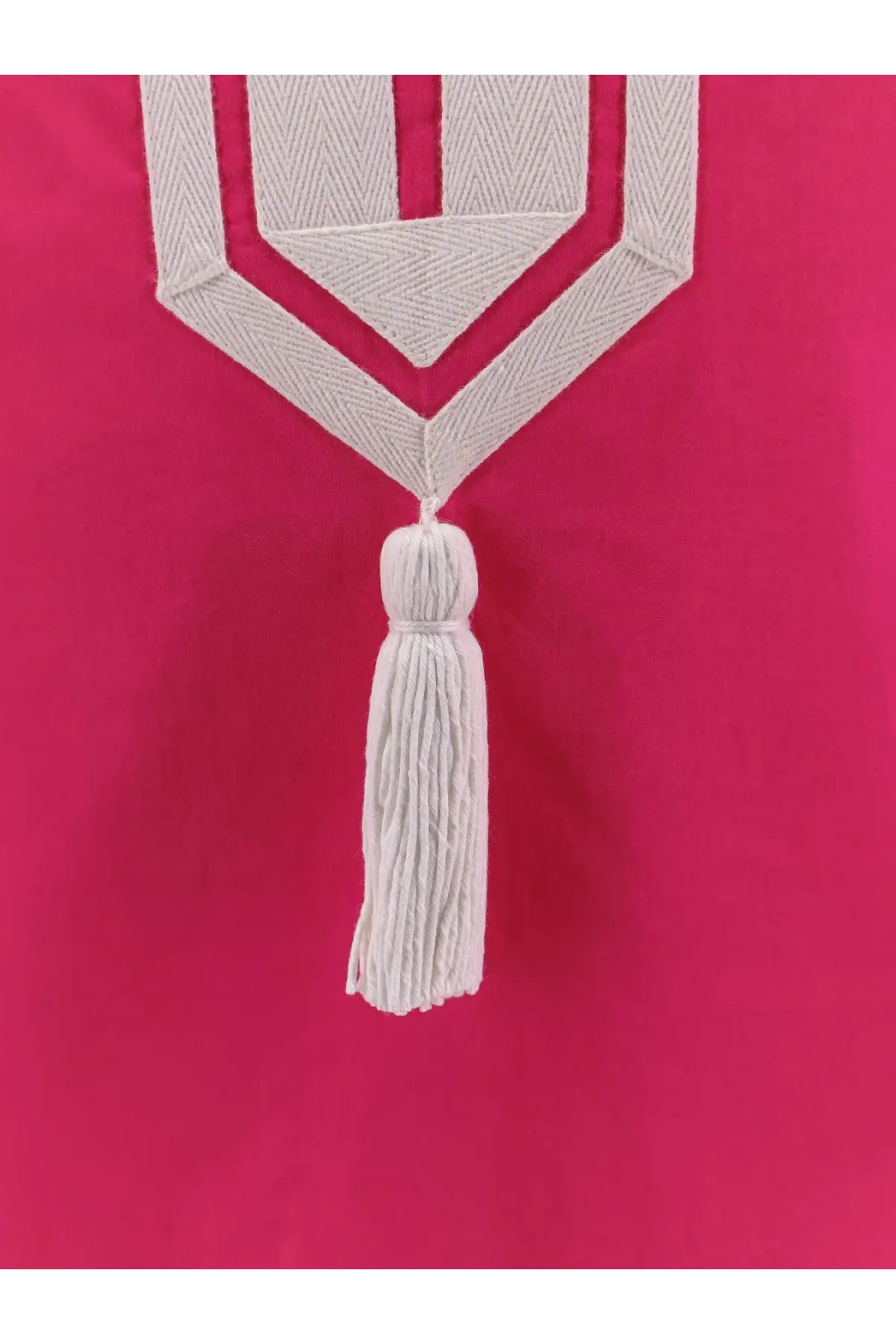 White embroidered tassel with geometric herringbone design on the top of tory burch women’s blue cotton short dress