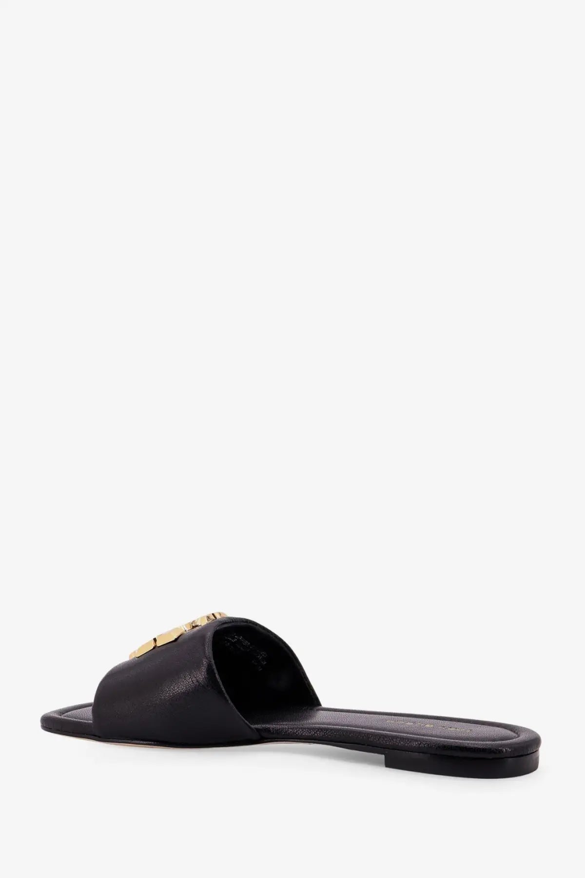 Black leather slide sandal with gold-tone Tory Burch logo emblem on the strap for women