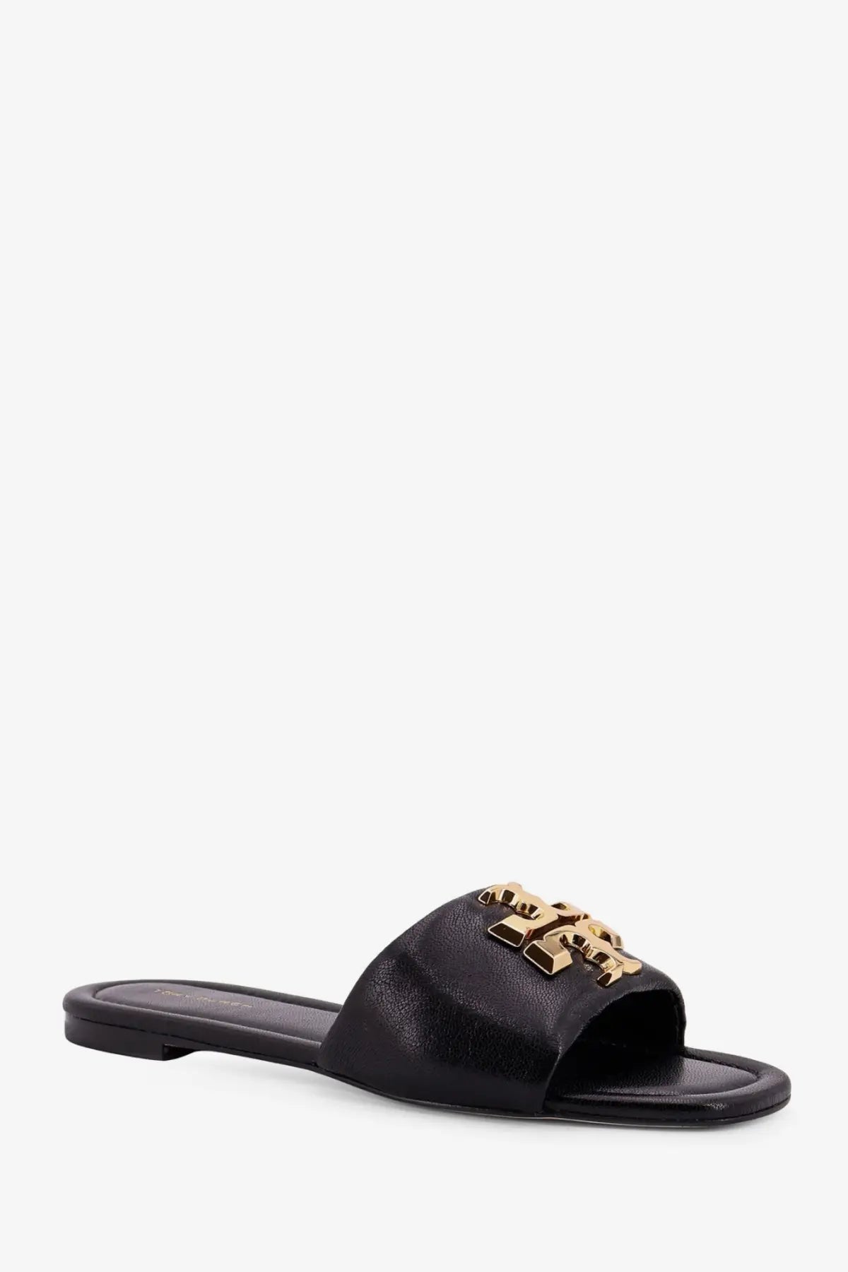 Black leather slide sandal with gold-tone tory burch logo emblem from tory burch womens eleanor flat sandals