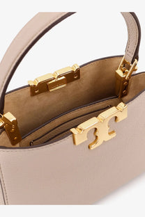 Beige leather Tory burch women’s eleanor pebbled mini satchel crossbody bag with gold-tone hardware and logo clasp