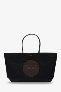 Tory Burch women’s Ella Twist black nylon tote bag with brown circular logo patch and matching handles
