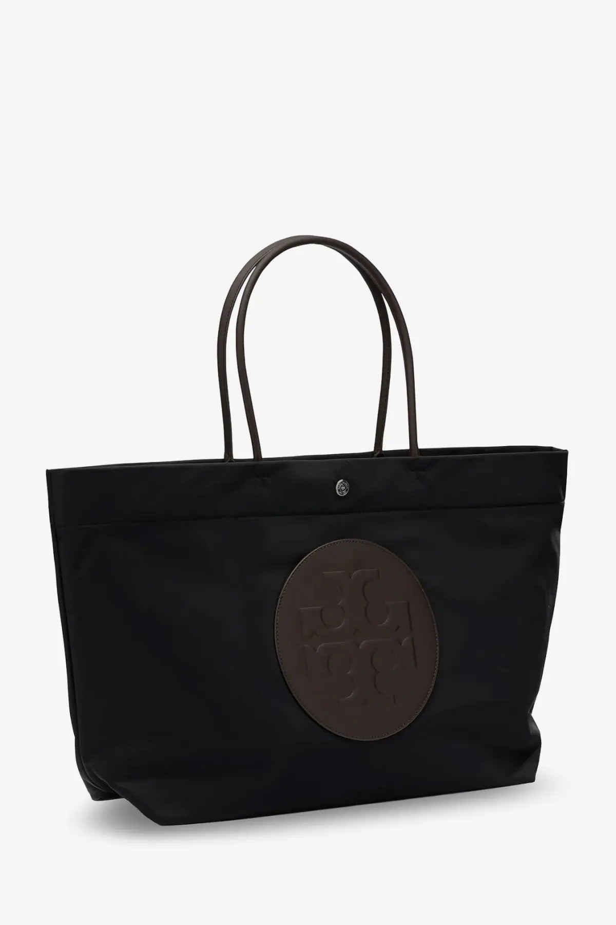 Black nylon Tory Burch women’s Ella Twist tote bag with brown leather like circular logo patch and matching handles