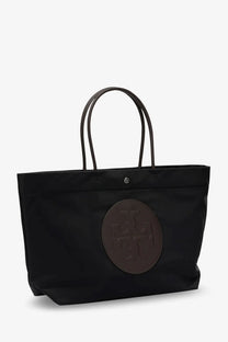 Black nylon Tory Burch women’s Ella Twist tote bag with brown leather like circular logo patch and matching handles